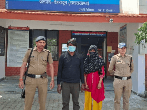 Image for Doon Police arrested the couple who stole from a woman's bag