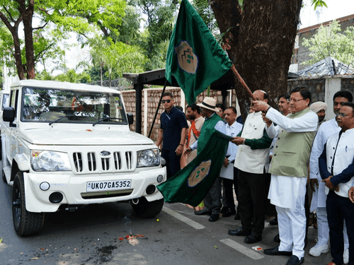 Image for CM Dhami flagged off 23 Bolero camper vehicles