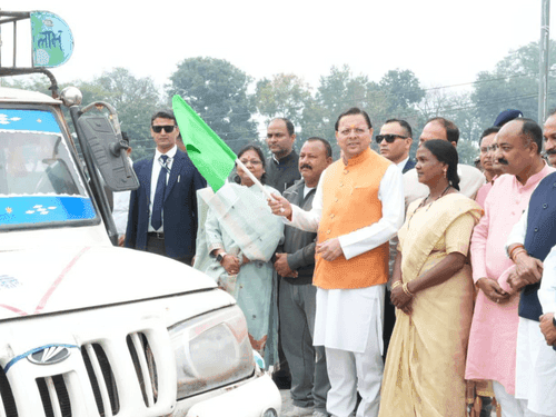 Image for CM Dhami flags off 6 mobile toilet vans from Khatima